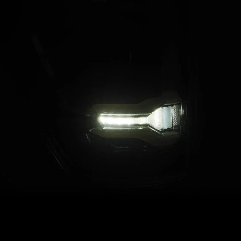 AlphaRex 21-23 Ford F-150 LUXX LED Taillights - Alpha-Black w/ BLIS - Installation View