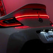 Load image into Gallery viewer, AlphaRex 22-24 Toyota GR86 LUXX LED Trunk Center Light Smoked - Installation View