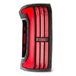 Load image into Gallery viewer, AlphaRex 24-25 Toyota Tacoma NOVA-Series LED Prismatic Tail Lights - Black Red - Back View