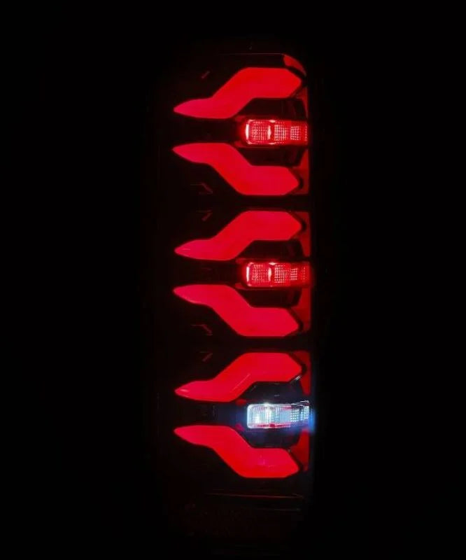 AlphaRex 87-96 Ford Bronco/F-150 Luxx-Series LED Tail Lights - Black Red - Side View