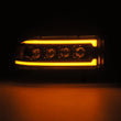 Load image into Gallery viewer, AlphaRex 94-01 RAM 1500 NOVA LED Proj Headlights Alpha-Blk w/Activ Light/Seq Signal/SB DRL - Side View