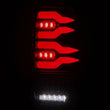 Load image into Gallery viewer, AlphaRex 97-03 Ford F150 / 99-16 Ford F250/F350/F450/F550 LUXX-Series LED Tail Lights - Alpha-Black - Installation View