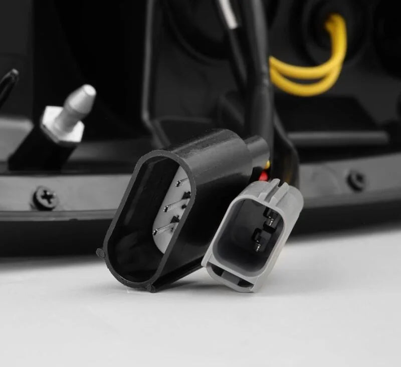 AlphaRex 97-03 Ford F150 / 99-16 Ford F250/F350/F450/F550 LUXX-Series LED Tail Lights - Black/Red - Installation View