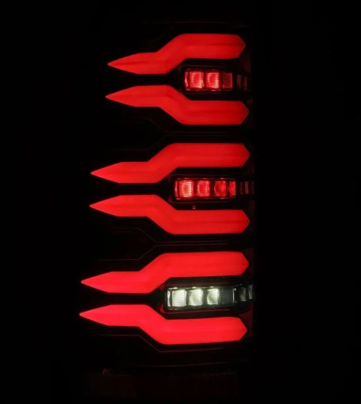 AlphaRex 99-06 Chevrolet Silverado Sierra LUXX-Series LED Tail Lights Alpha-Black - Side View