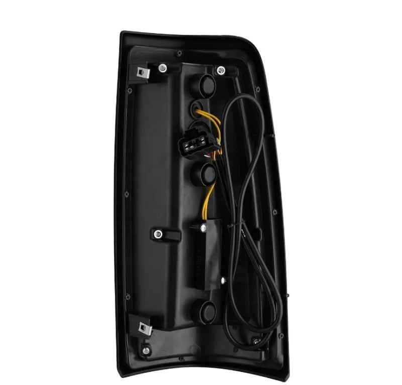 AlphaRex 99-06 Chevrolet Silverado Sierra LUXX-Series LED Tail Lights Alpha-Black - Installation View