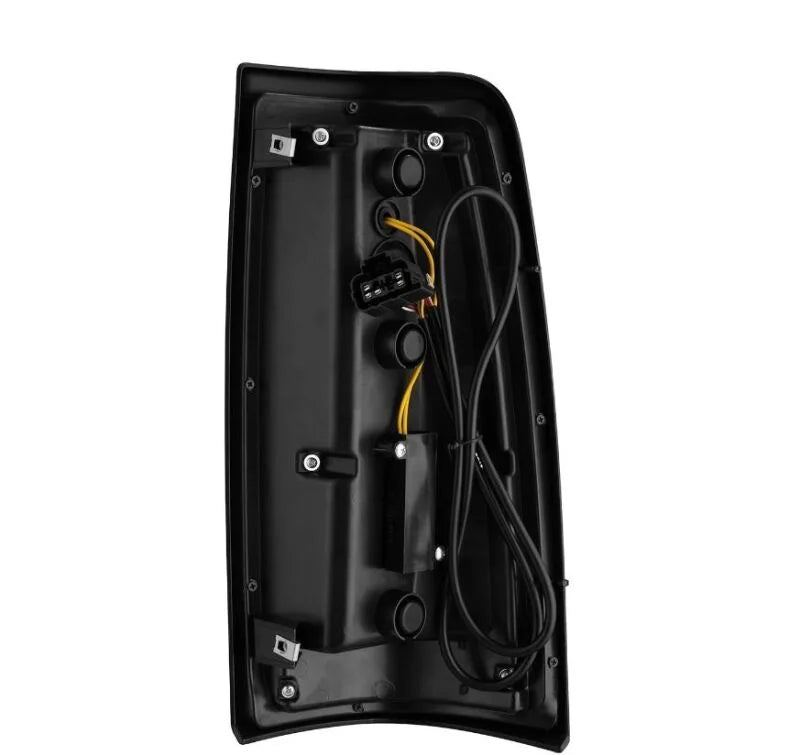 AlphaRex 99-06 Chevrolet Silverado/99-06 GMC Sierra LUXX-Series LED Tail Lights - Black - Side View