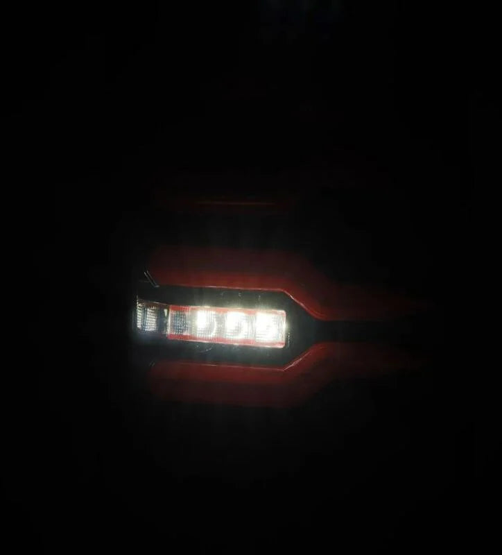 AlphaRex 99-06 Chevrolet Silverado/99-06 GMC Sierra LUXX-Series LED Tail Lights - Black/Red - Side View
