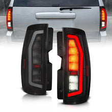 Load image into Gallery viewer, Anzo Black Full LED Tail Light Plank Style w/ Smoke Lens fits 2007-2014 Chevrolet Suburban / Tahoe / GMC Yukon / Yukon Xl - Main Product Vi...