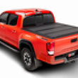 Load image into Gallery viewer, BAK 05-15 Toyota Tacoma 6ft Bed (w/o Universal Tailgate Function) BAKFlip MX4 Matte Finish - Main Product View