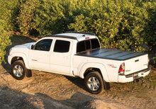 Load image into Gallery viewer, BAK 2022 Nissan Frontier 6ft Bed BAKFlip G2 - Side View