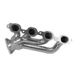 Load image into Gallery viewer, BBK 14-18 GM Truck 5.3/6.2 1 3/4in Shorty Tuned Length Headers - Polished Silver Ceramic - Installation View