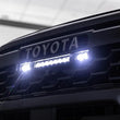 Load image into Gallery viewer, Baja Designs 10in. S8/S2 Pro Grille Kit - Clear fits 2024-2025 Toyota Tacoma (incl. TRD Pro) / LIMITED - Main Product View