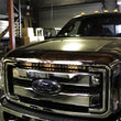 Load image into Gallery viewer, Baja Designs 11-16 Ford Super Duty S8 Series 30in Grille LED Light Bar Kit - Side View