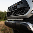 Load image into Gallery viewer, Baja Designs 2016+ Toyota Tacoma S8 30 inch Front Bumper Kit - Installation View