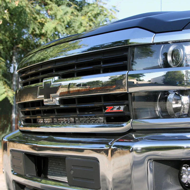 Baja Designs 2017 Chevreolet Silverado 2500/3500 HD 30in OnX6+ Grille Light Bar Kit - 5000K Daylight - Side View