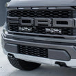 Load image into Gallery viewer, Baja Designs 2021+ Ford Raptor OnX6 Behind Grill Kit -10in. Amber D/C - Side View