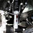 Load image into Gallery viewer, Belltech Trail Performance Lifting Strut 16-20 Toyota Tacoma 4WD 4-6IN - Front - Installation View