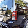 Load image into Gallery viewer, Black Horse Off Road Tail Light Guards 7G110206A fits 2005-2012 Nissan Pathfinder - Main Product View