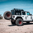Load image into Gallery viewer, Body Armor 4x4 2019+ Jeep Wrangler JL Tire Carrier Single Action (Only Fits w/ JL-2965 Bumper) - Installation View