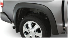 Load image into Gallery viewer, Bushwacker 07-13 Toyota Tundra Fleetside OE Style Flares 4pc w/ Factory Mudflap - Black - Additional View 8