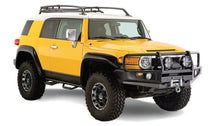 Load image into Gallery viewer, Bushwacker 07-14 Toyota FJ Cruiser Extend-A-Fender Style Flares 4pc - Black - Additional View 5
