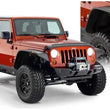 Load image into Gallery viewer, Bushwacker 07-18 Jeep Wrangler Unlimited Flat Style Flares 4pc 4-Door Sport Utility Only - Black - Main Product View