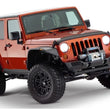 Load image into Gallery viewer, Bushwacker 07-18 Jeep Wrangler Unlimited Flat Style Flares 4pc 4-Door Sport Utility Only - Black - Back View