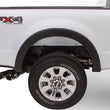 Load image into Gallery viewer, Bushwacker 09-14 Ford F-150 Styleside OE Style Flares 4pc 67.0/78.8/97.4in Bed - Black - Installation View