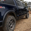 Load image into Gallery viewer, Bushwacker 09-14 Ford F-150 Styleside OE Style Flares 4pc 67.0/78.8/97.4in Bed - Black - Additional View 5