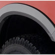 Load image into Gallery viewer, Bushwacker 10-18 Dodge Ram 2500 Fleetside OE Style Flares 4pc 76.3/98.3in Bed - Black - Side View