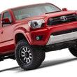 Load image into Gallery viewer, Bushwacker 12-15 Toyota Tacoma Fleetside Pocket Style Flares 4pc 73.5in Bed - Black - Back View