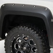 Load image into Gallery viewer, Bushwacker 16-18 GMC Sierra 1500 Pocket Style Flares 4pc - Black - Back View