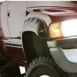 Load image into Gallery viewer, Bushwacker 20-22 Ram 1500 (Excl. Rebel/TRX) 76.3/67.4in Bed Pocket Style Flares 4pc - Diamd. Black - Side View