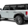 Load image into Gallery viewer, Bushwacker 2021+ Ford Bronco 4-Door Pocket Style Flares 4pc - Black - Installation View