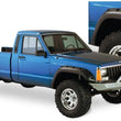 Load image into Gallery viewer, Bushwacker 84-01 Jeep Cherokee Cutout Style Flares 4pc Fits 2-Door Sport Utility Only - Black - Main Product View