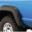 Load image into Gallery viewer, Bushwacker 84-01 Jeep Cherokee Cutout Style Flares 4pc Fits 2-Door Sport Utility Only - Black - Side View