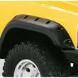 Load image into Gallery viewer, Bushwacker 84-01 Jeep Cherokee Cutout Style Flares 4pc Fits 2-Door Sport Utility Only - Black - Back View