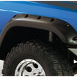 Load image into Gallery viewer, Bushwacker 84-01 Jeep Cherokee Cutout Style Flares 4pc Fits 2-Door Sport Utility Only - Black - Installation View