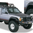 Load image into Gallery viewer, Bushwacker 84-01 Jeep Cherokee Cutout Style Flares 4pc Fits 4-Door Sport Utility Only - Black - Main Product View