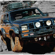 Load image into Gallery viewer, Bushwacker 84-01 Jeep Cherokee Cutout Style Flares 4pc Fits 4-Door Sport Utility Only - Black - Installation View