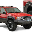 Load image into Gallery viewer, Bushwacker 93-98 Jeep Grand Cherokee Cutout Style Flares 4pc - Black - Main Product View