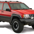 Load image into Gallery viewer, Bushwacker 93-98 Jeep Grand Cherokee Cutout Style Flares 4pc - Black - Additional View 6