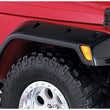 Load image into Gallery viewer, Bushwacker 97-06 Jeep TJ Max Pocket Style Flares 4pc - Black - Installation View