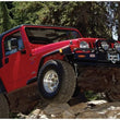Load image into Gallery viewer, Bushwacker 97-06 Jeep TJ Max Pocket Style Flares 4pc - Black - Additional View 5