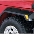 Load image into Gallery viewer, Bushwacker 97-06 Jeep TJ Pocket Style Flares 4pc - Black - Installation View