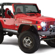 Load image into Gallery viewer, Bushwacker 97-06 Jeep Wrangler Flat Style Flares 4pc - Black - Additional View 5