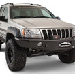 Load image into Gallery viewer, Bushwacker 99-04 Jeep Grand Cherokee Cutout Style Flares 4pc - Black - Additional View 5