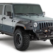 Load image into Gallery viewer, Bushwacker 07-18 Jeep Wrangler Unlimited Pocket Style Flares 2pc 4-Door Sport Utility Only - Black - Main Product View