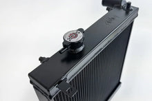 Load image into Gallery viewer, CSF 03-07 Mitsubishi Lancer EVO 7/8/9 1/2 Size Radiator - Black - Main Product View