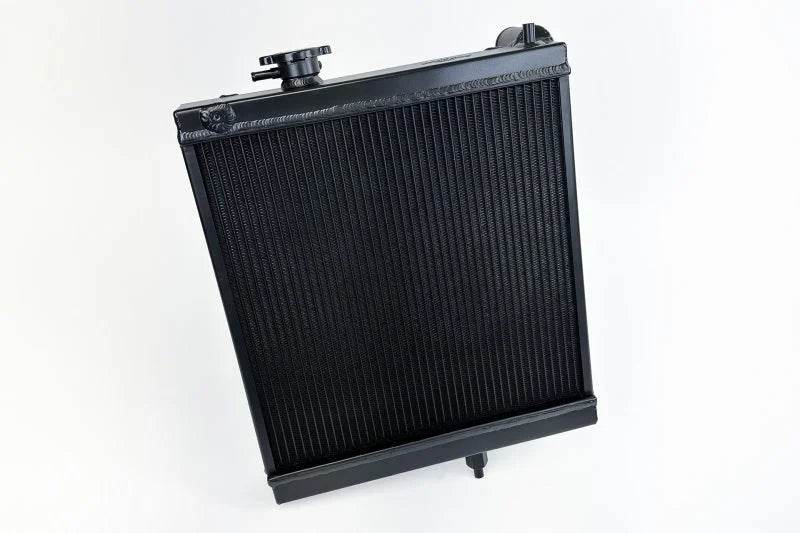 CSF 03-07 Mitsubishi Lancer EVO 7/8/9 1/2 Size Radiator - Black - Side View